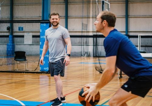 two men playing basketball